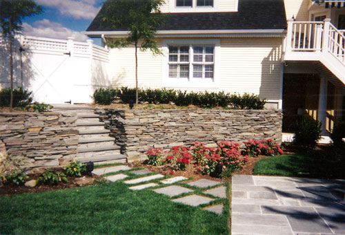 rock and boulder landscaping by anchor landscape custom landscape design masonry