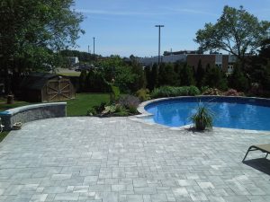 Holbrook landscape design with custom masonry by anchor landscape